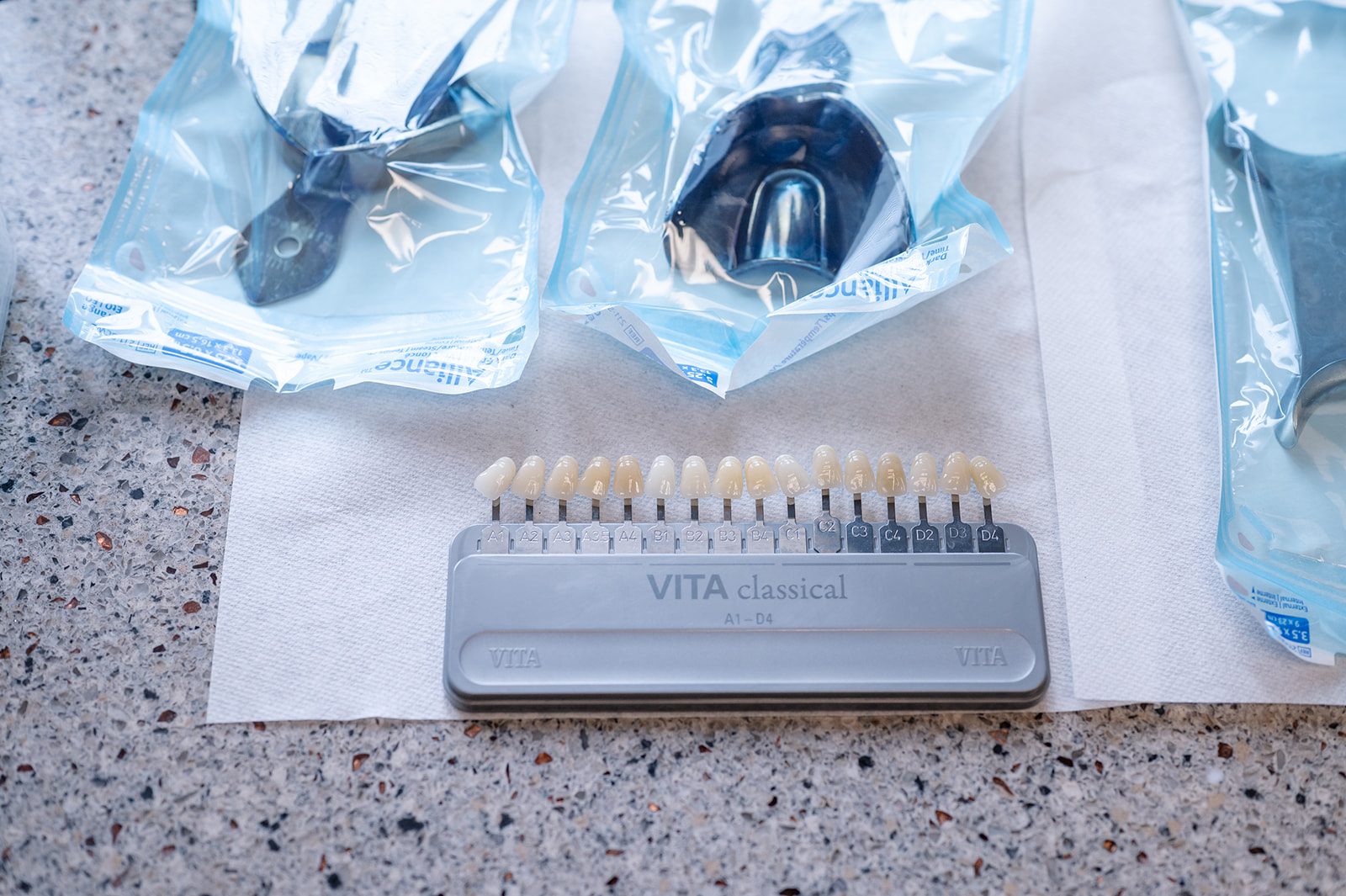 A professional shade guide used to match and plan cosmetic dental treatment